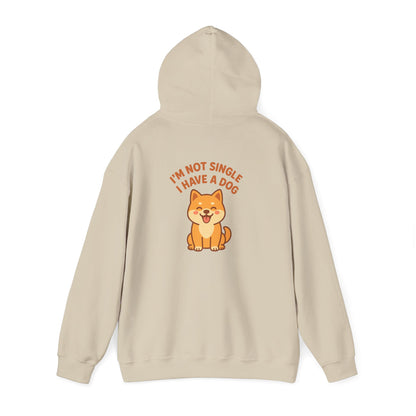 Beige hoodie with a dog graphic and text on the back against a white background