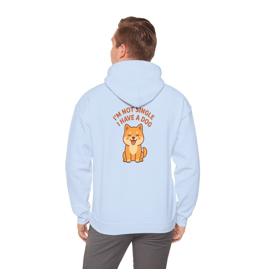 Light blue hoodie with a dog graphic and text on the back, worn by a person.